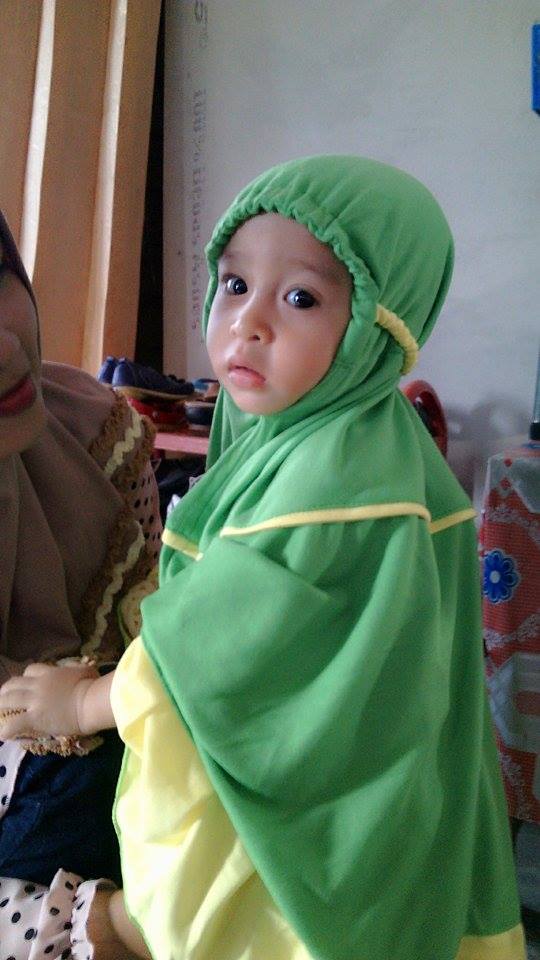 siti-hartina-mukena-jamur-hijau
